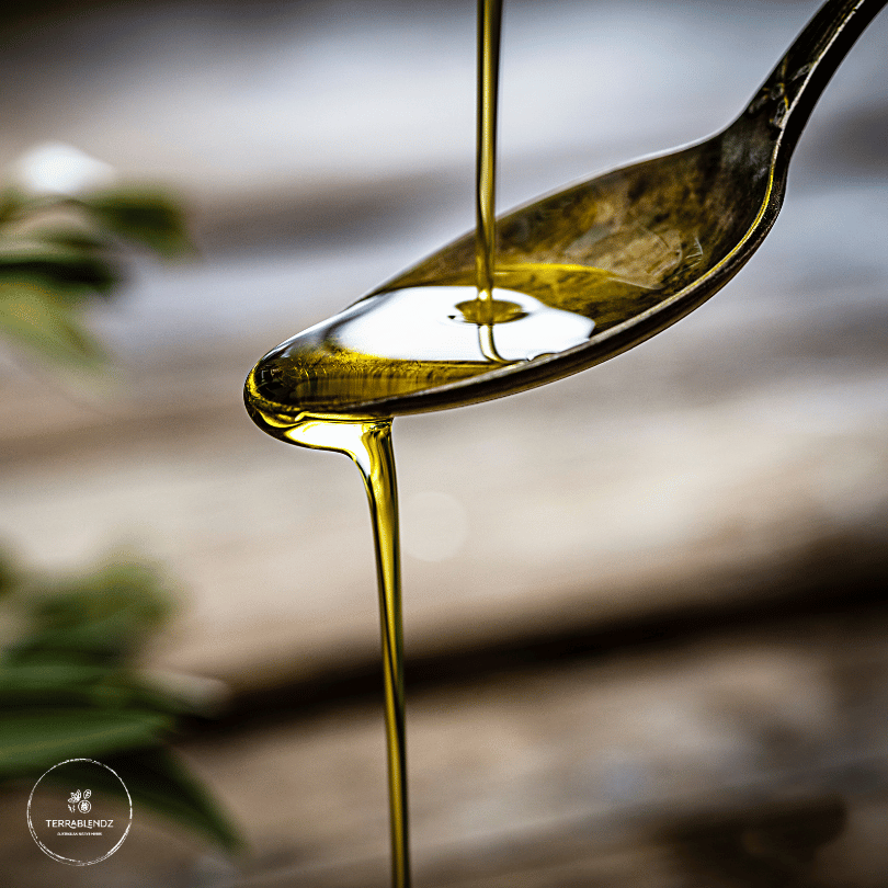 Terrablendz Saltbush Infused Olive Oil pouring over a spoon
