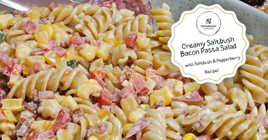 Creamy saltbush bacon pasta salad in a white serving bowl, seasoned with Australian native herbs and Terrablendz Bush Salt