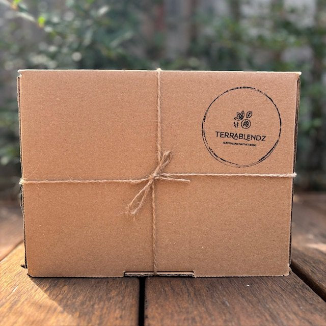 Terrablendz Eco-Friendly Packaging solutions, cardboard box on wood.