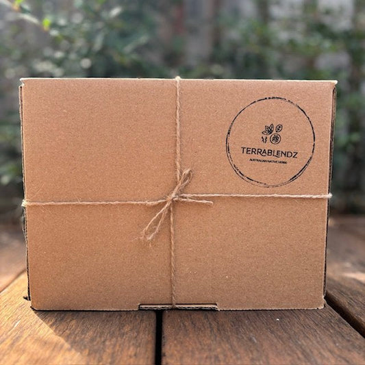 Terrablendz Eco-Friendly Packaging solutions, cardboard box on wood.