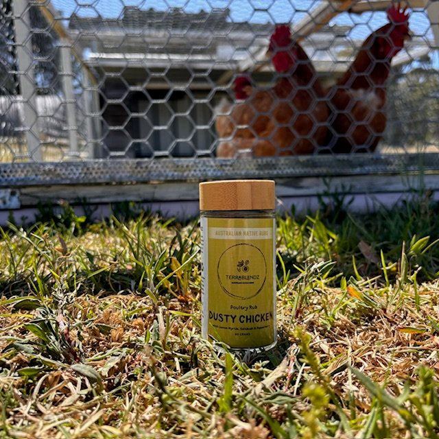 Terrablendz Dusty Chicken Poultry rub in front of a chicken Coop.