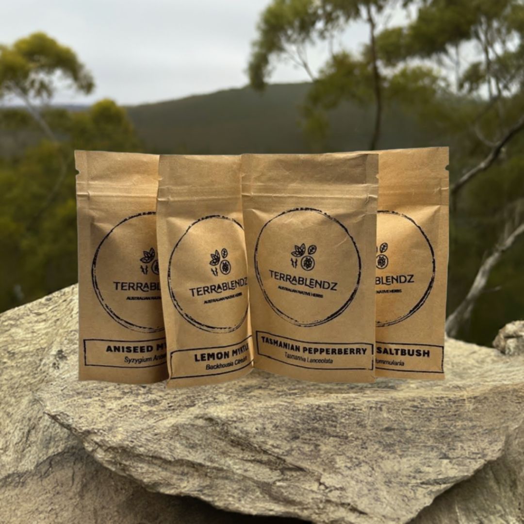 Mini Native Herb Packs: on a rock platform with the Australian bush.