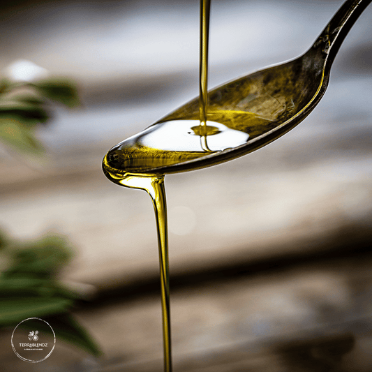 Terrablendz Saltbush Infused Olive Oil pouring over a spoon